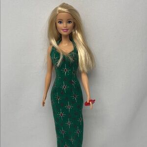 Barbie With Green and Red Patterned Dress .
